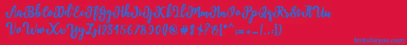 Manda Script Font – Blue Fonts on Red Background