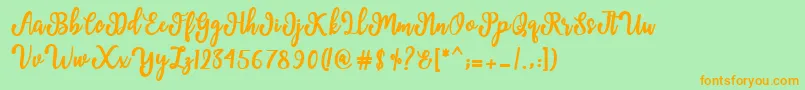 Manda Script Font – Orange Fonts on Green Background