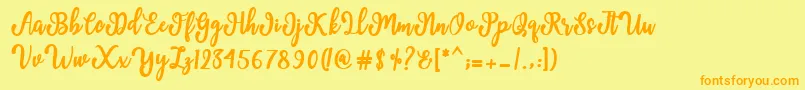 More about Manda Script Font Manda Script Font – Orange Fonts on Yellow Background