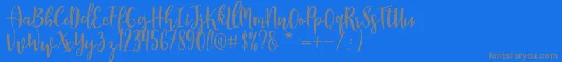 Manda Font – Gray Fonts on Blue Background