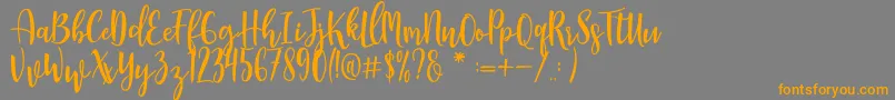 Manda Font – Orange Fonts on Gray Background