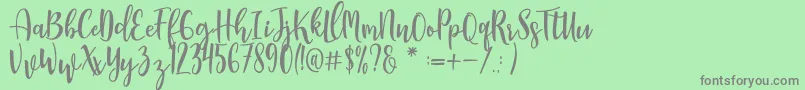 Manda Font – Gray Fonts on Green Background