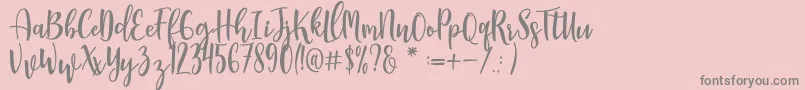 More about Manda Font Manda Font – Gray Fonts on Pink Background