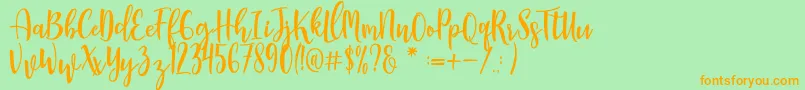 Manda Font – Orange Fonts on Green Background