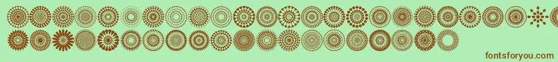 フォントMandalas pro – 緑の背景に茶色のフォント