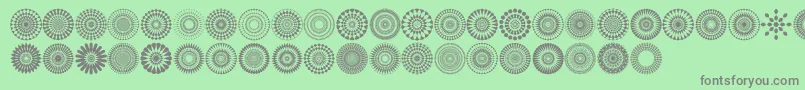 Mandalas pro-Schriftart – Graue Schriften auf grünem Hintergrund