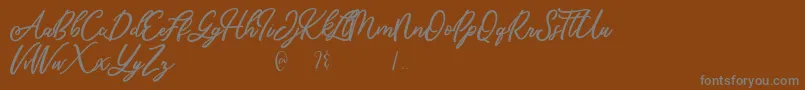 Mandymores Font – Gray Fonts on Brown Background