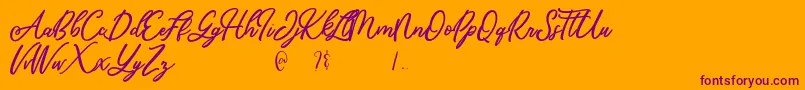 Czcionka Mandymores – fioletowe czcionki na pomarańczowym tle