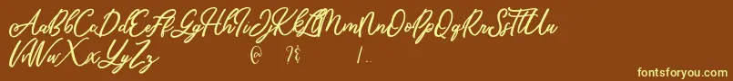 Mandymores-fontti – keltaiset fontit ruskealla taustalla