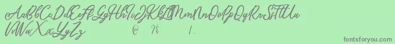 Mandymores Font – Gray Fonts on Green Background