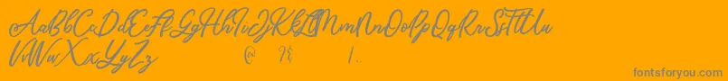 Mandymores-fontti – harmaat kirjasimet oranssilla taustalla