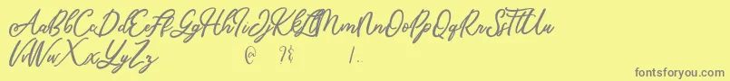 Mandymores-Schriftart – Graue Schriften auf gelbem Hintergrund