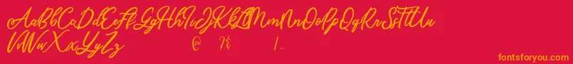 Czcionka Mandymores – pomarańczowe czcionki na czerwonym tle