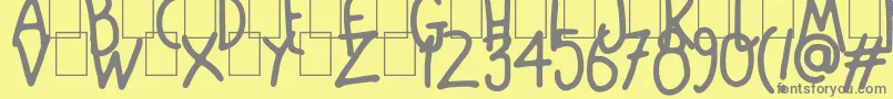フォントMango Slice – 黄色の背景に灰色の文字