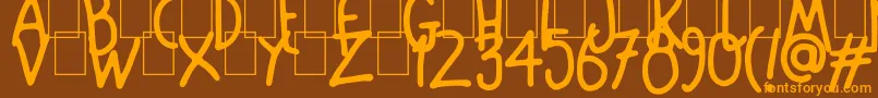 Mango Slice Font – Orange Fonts on Brown Background