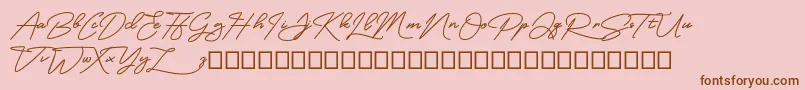 MangoSign-Schriftart – Braune Schriften auf rosa Hintergrund