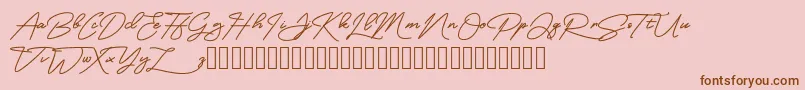 MangoSign-Schriftart – Braune Schriften auf rosa Hintergrund