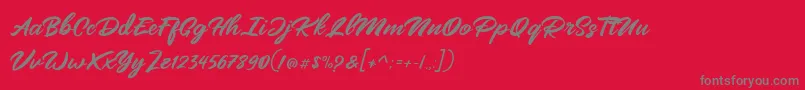 フォントMangotea   FREE PERSONAL USE – 赤い背景に灰色の文字