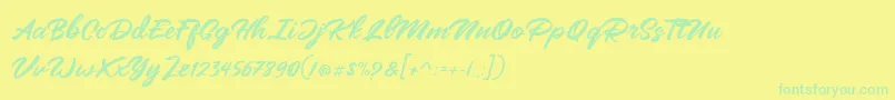 Mangotea   FREE PERSONAL USE-Schriftart – Grüne Schriften auf gelbem Hintergrund