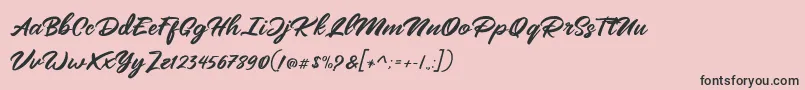 フォントMangotea   FREE PERSONAL USE – ピンクの背景に黒い文字