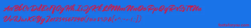 Mangotea   FREE PERSONAL USE-Schriftart – Rote Schriften auf blauem Hintergrund