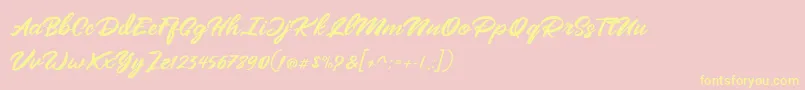 Mangotea   FREE PERSONAL USE-Schriftart – Gelbe Schriften auf rosa Hintergrund