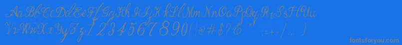 Fonte Manhattan Script – fontes cinzas em um fundo azul