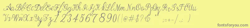 Weitere Informationen zur Manhattan Script-Schriftart Manhattan Script-Schriftart – Graue Schriften auf gelbem Hintergrund
