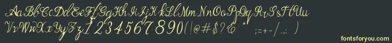 フォントManhattan Script – 黒い背景に黄色の文字