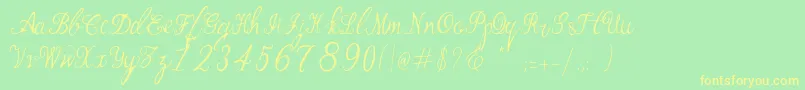 Czcionka Manhattan Script – żółte czcionki na zielonym tle