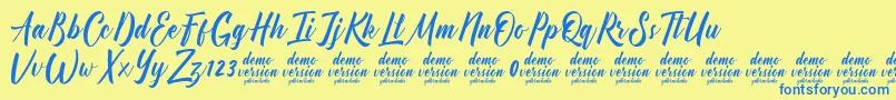 Fonte Manhattan Typeface Demo – fontes azuis em um fundo amarelo