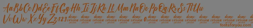 Manhattan Typeface Demo-Schriftart – Braune Schriften auf grauem Hintergrund