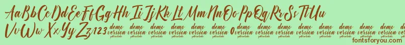 Manhattan Typeface Demo-Schriftart – Braune Schriften auf grünem Hintergrund