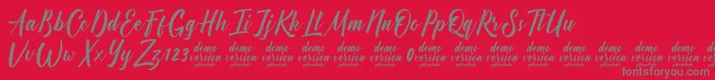 Fonte Manhattan Typeface Demo – fontes cinzas em um fundo vermelho