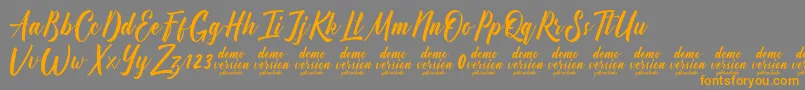 Manhattan Typeface Demo Font – Orange Fonts on Gray Background