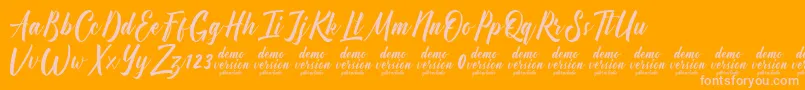 Manhattan Typeface Demo Font – Pink Fonts on Orange Background