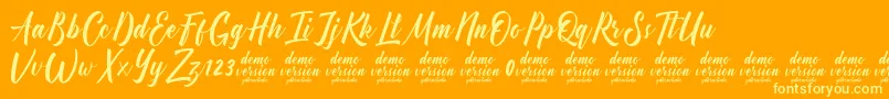 Manhattan Typeface Demo-Schriftart – Gelbe Schriften auf orangefarbenem Hintergrund