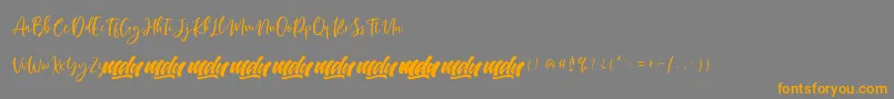 Manilla Script   FREE PERSONAL Font – Orange Fonts on Gray Background