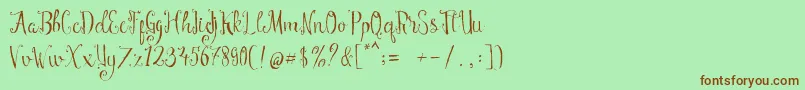 Manny Scriptフォントについての詳細 フォントManny Script – 緑の背景に茶色のフォント