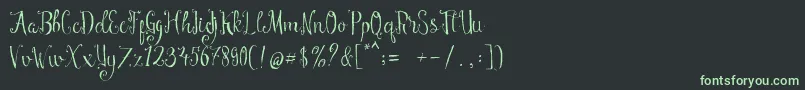 フォントManny Script – 黒い背景に緑の文字
