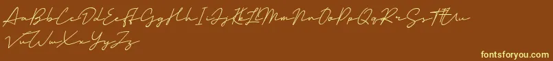 Mansions Demo Font – Yellow Fonts on Brown Background