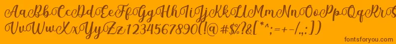 Czcionka Mantul Font by Rifky 7NTypes – brązowe czcionki na pomarańczowym tle