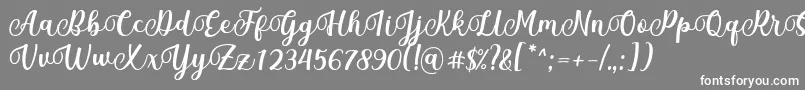 Шрифт Mantul Font by Rifky 7NTypes – белые шрифты на сером фоне