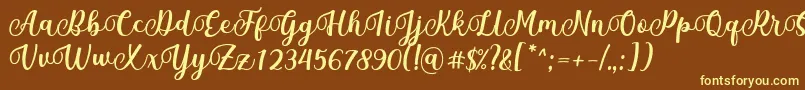 Mantul Font by Rifky 7NTypes-fontti – keltaiset fontit ruskealla taustalla