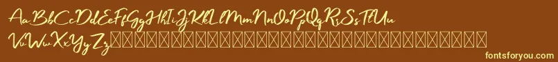 Manyland Font – Yellow Fonts on Brown Background