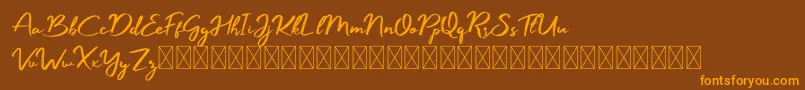 Manyland Font – Orange Fonts on Brown Background