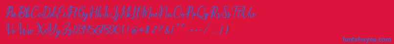 Maqella Script Font – Blue Fonts on Red Background