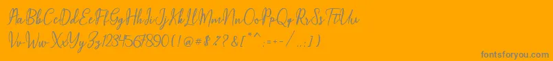 Maqella Script-Schriftart – Graue Schriften auf orangefarbenem Hintergrund