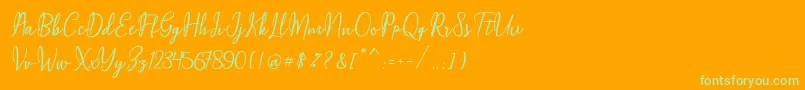 Maqella Script Font – Green Fonts on Orange Background