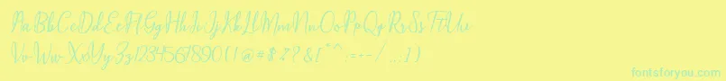 Maqella Script Font – Green Fonts on Yellow Background